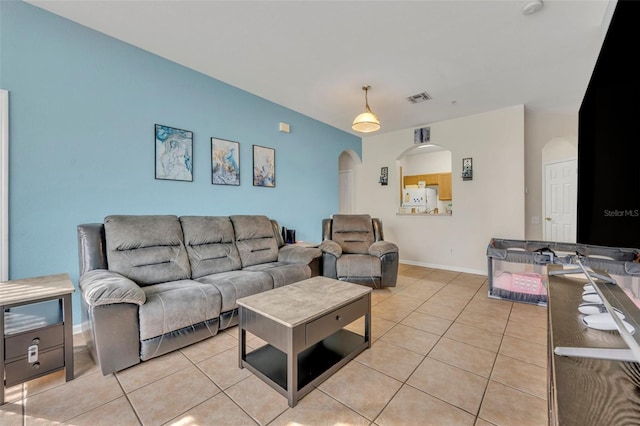 living room with light tile patterned flooring