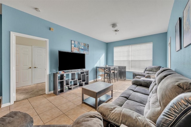 living room with light tile patterned floors