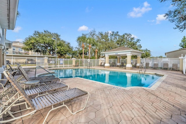 view of pool featuring a patio area and a gazebo