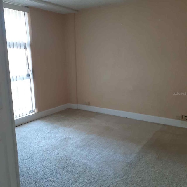 empty room with carpet floors