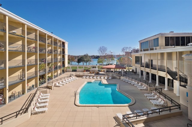 view of swimming pool featuring a patio