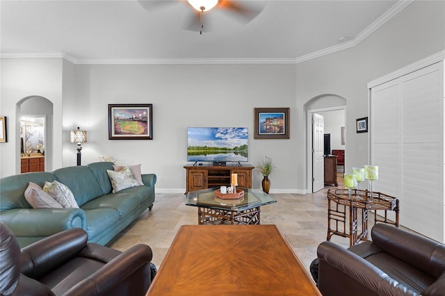 living room with crown molding and ceiling fan