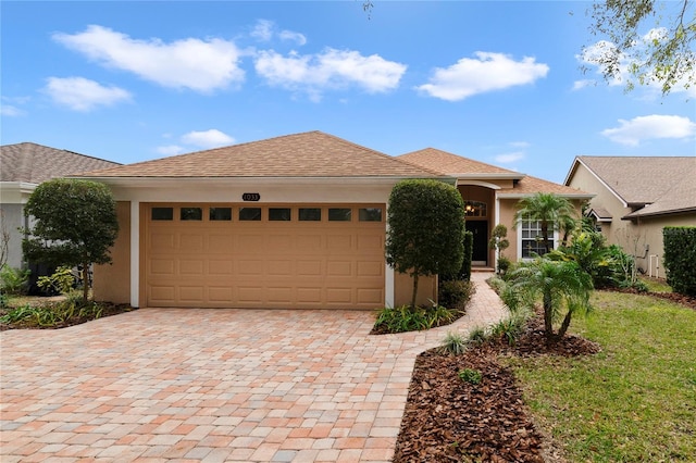 view of front of home with a garage