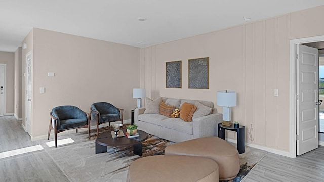 living room with light hardwood / wood-style flooring