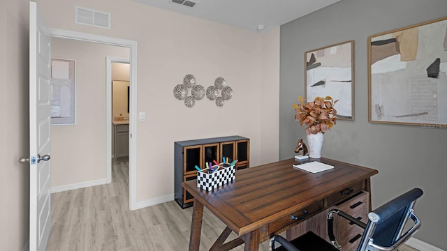 office space featuring light hardwood / wood-style floors