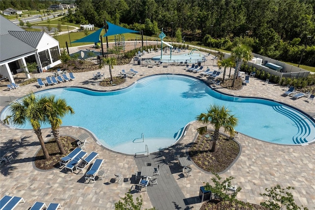 view of pool featuring a patio area