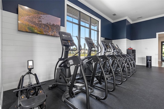 gym featuring ornamental molding