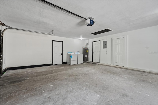 garage featuring electric panel, electric water heater, independent washer and dryer, and a garage door opener