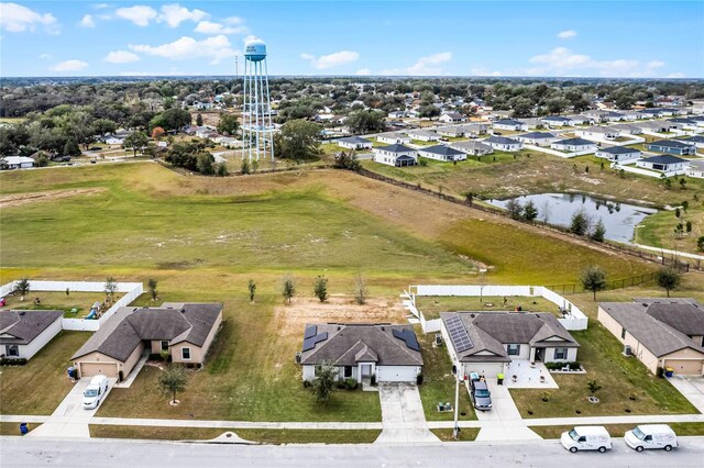 1952 Piedmont Ct, Mascotte, FL 34753 - aerial perspective of suburban area featuring a large body of water