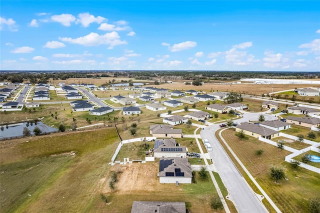 1952 Piedmont Ct, Mascotte, FL 34753 - aerial perspective of suburban area with a nearby body of water