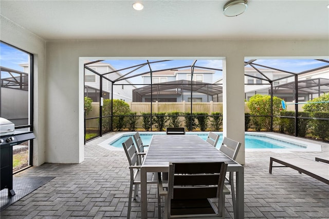 view of pool featuring a jacuzzi and a patio