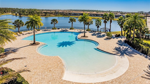 view of pool featuring a water view