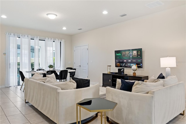 living room featuring light tile patterned floors