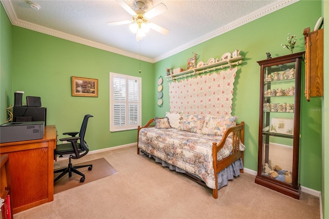 bedroom featuring ceiling fan, crown molding, light colored carpet, and a textured ceiling