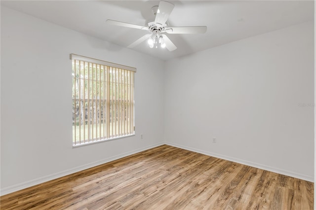 unfurnished room featuring ceiling fan and light hardwood / wood-style floors