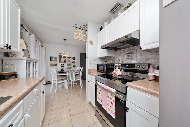 kitchen featuring decorative light fixtures, tasteful backsplash, light tile patterned flooring, white cabinetry, and stainless steel range with electric stovetop