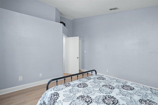 bedroom featuring light hardwood / wood-style floors