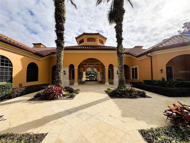 view of front of house with a patio