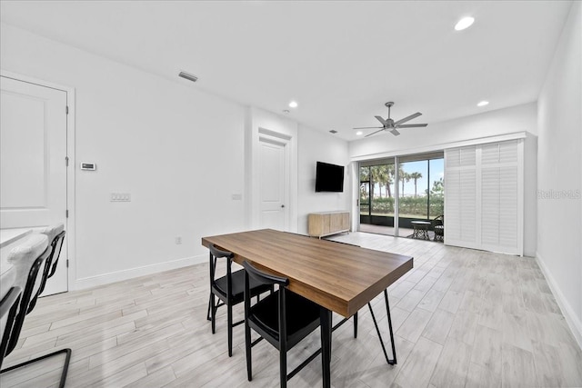 dining room featuring ceiling fan