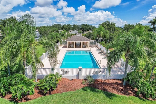 view of pool featuring a patio