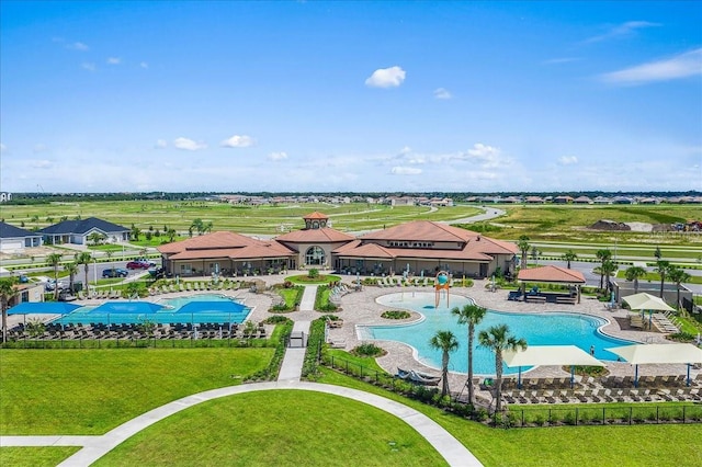 view of swimming pool featuring a yard and a gazebo