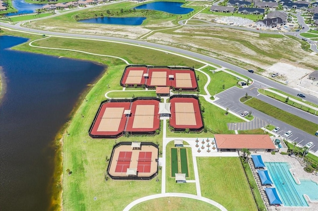 birds eye view of property featuring a water view