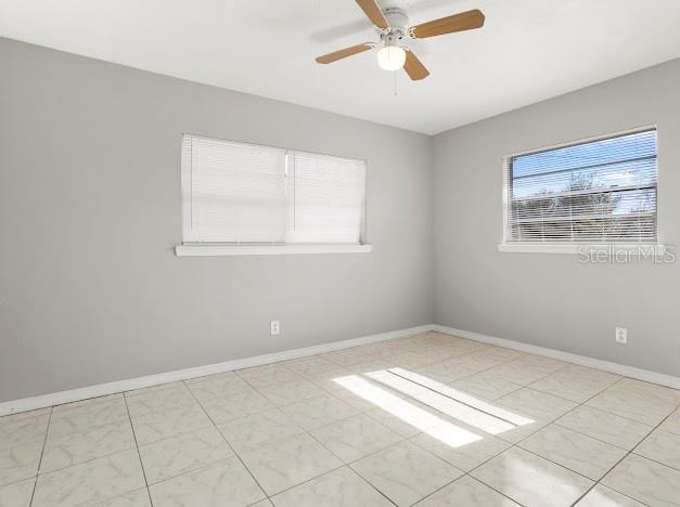 empty room with ceiling fan