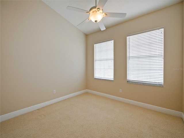 unfurnished room with light carpet and ceiling fan