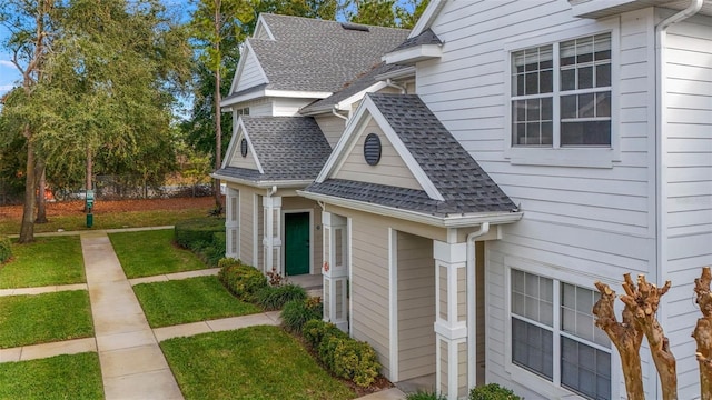 view of side of property featuring a yard