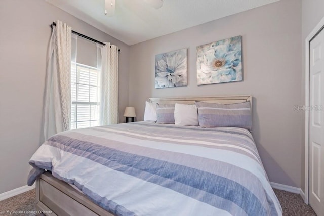 carpeted bedroom with ceiling fan