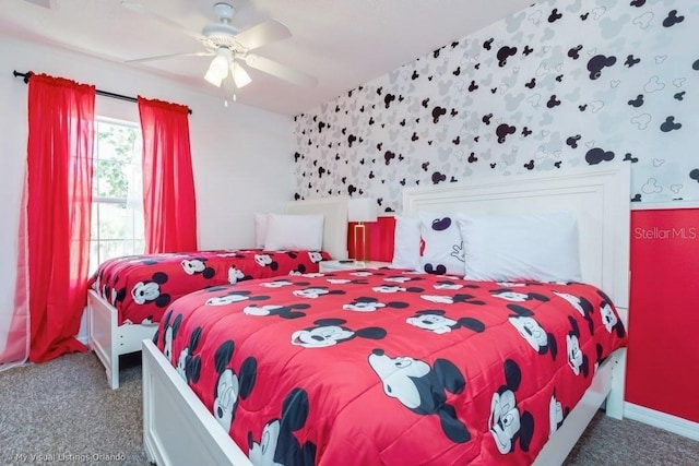 bedroom with dark carpet and ceiling fan