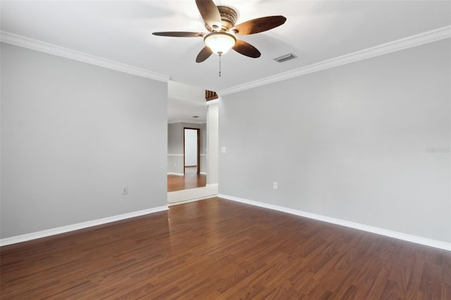 unfurnished room with dark wood-type flooring, ceiling fan, and ornamental molding