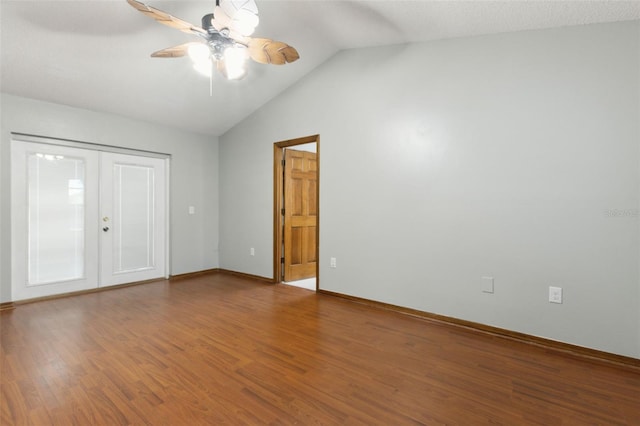 interior space featuring lofted ceiling, hardwood / wood-style floors, french doors, and ceiling fan