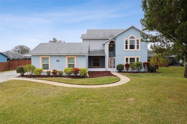 front facade featuring a front lawn