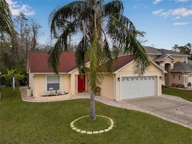 single story home featuring a garage and a front yard