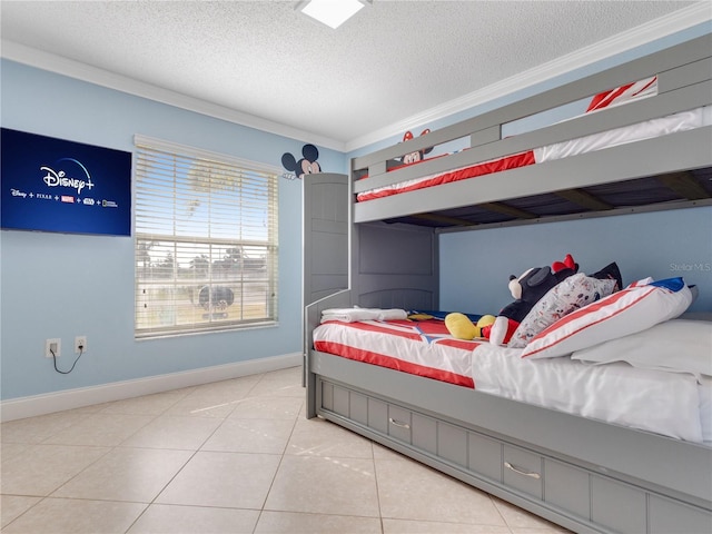 tiled bedroom featuring a textured ceiling and crown molding