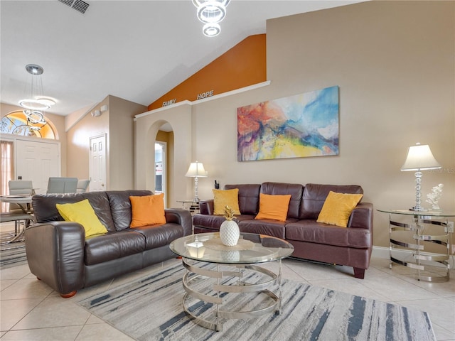 tiled living room featuring lofted ceiling