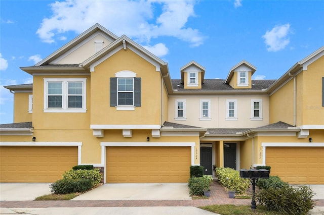 view of property with a garage