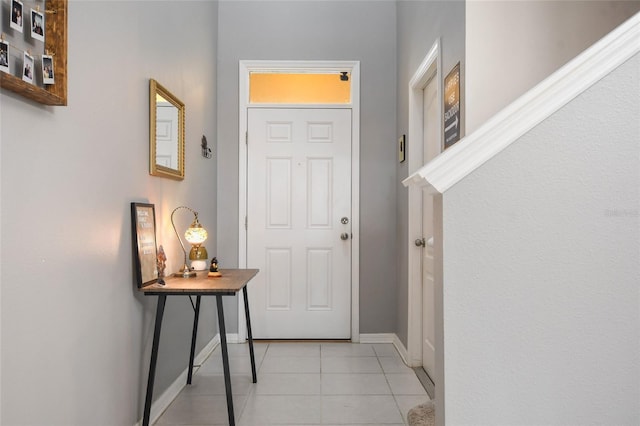 entryway featuring light tile patterned floors