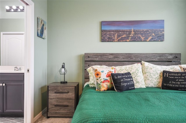 bedroom featuring light carpet