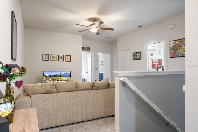 living room featuring ceiling fan