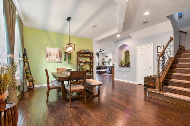 1416 Cabot Dr, Clermont, FL 34711 - dining room featuring recessed lighting, arched walkways, stairs, hardwood / wood-style floors, and baseboards