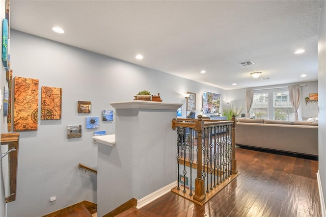 1416 Cabot Dr, Clermont, FL 34711 - interior space featuring an upstairs landing, dark wood-type flooring, visible vents, and recessed lighting