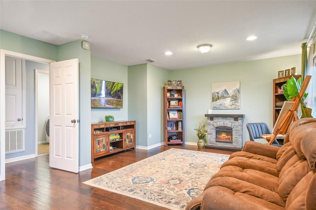 1416 Cabot Dr, Clermont, FL 34711 - living area with visible vents, baseboards, recessed lighting, dark wood finished floors, and a fireplace