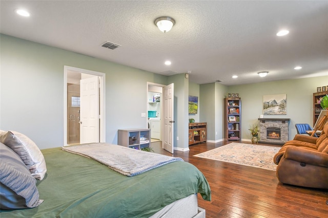1416 Cabot Dr, Clermont, FL 34711 - bedroom featuring wood-type flooring, recessed lighting, visible vents, and a fireplace