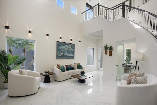 living room featuring a high ceiling