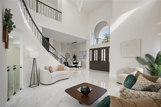 living room featuring a high ceiling