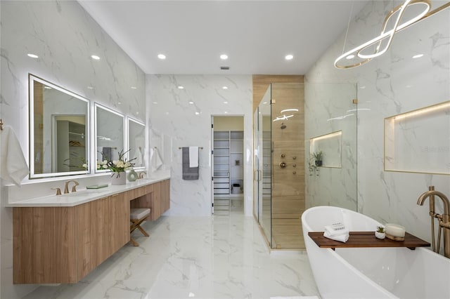 bathroom featuring vanity, plus walk in shower, and tile walls