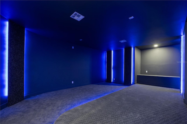 home theater room with carpet flooring