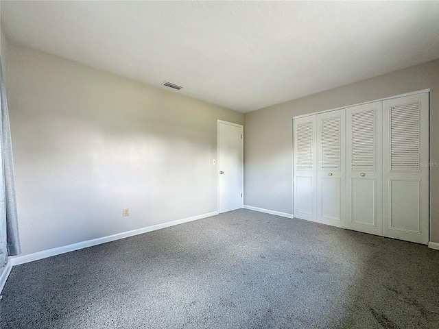 unfurnished bedroom with a closet